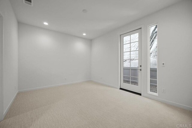 2545 Broom Ln, Carlsbad, CA 92008 - carpeted empty room with baseboards and recessed lighting