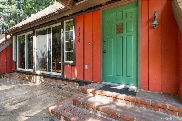 118 E Ln, Lake Arrowhead, CA 92352 - doorway to property with board and batten siding