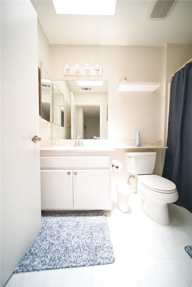 532 Venice Way Unit 8, Inglewood, CA 90302 - full bathroom with vanity, a skylight, tile patterned floors, and a shower with curtain