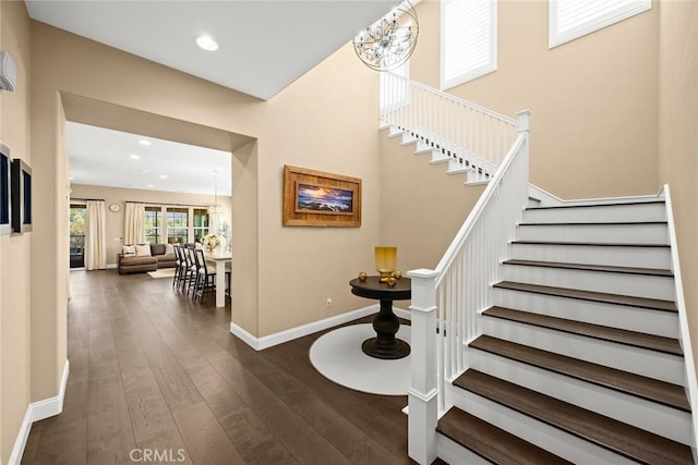 1252 N Lindley St, Azusa, CA 91702 - stairway featuring hardwood / wood-style floors, baseboards, recessed lighting, and a chandelier
