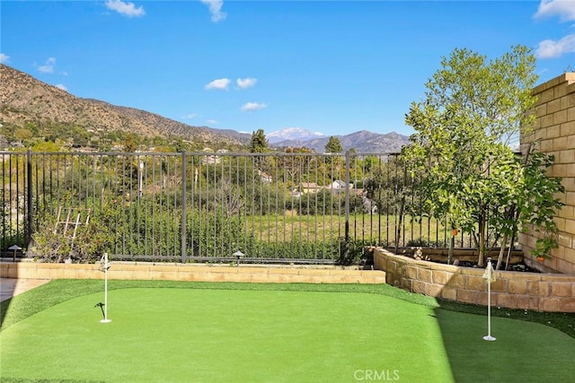 1252 N Lindley St, Azusa, CA 91702 - view of yard with a putting green and a mountain view