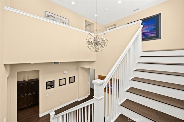 1252 N Lindley St, Azusa, CA 91702 - stairs with wood finished floors, a chandelier, and recessed lighting