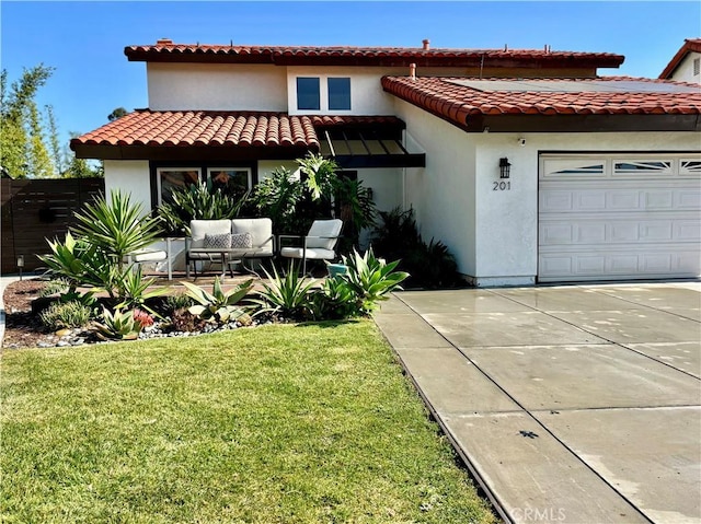 201 Todd Ct, Oceanside, CA 92054 - mediterranean / spanish home featuring a garage, a front yard, stucco siding, and a tile roof