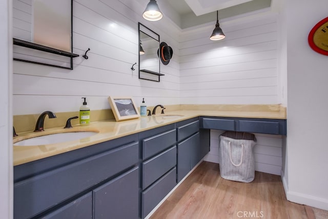201 Todd Ct, Oceanside, CA 92054 - full bath with wood finished floors, double vanity, and wooden walls