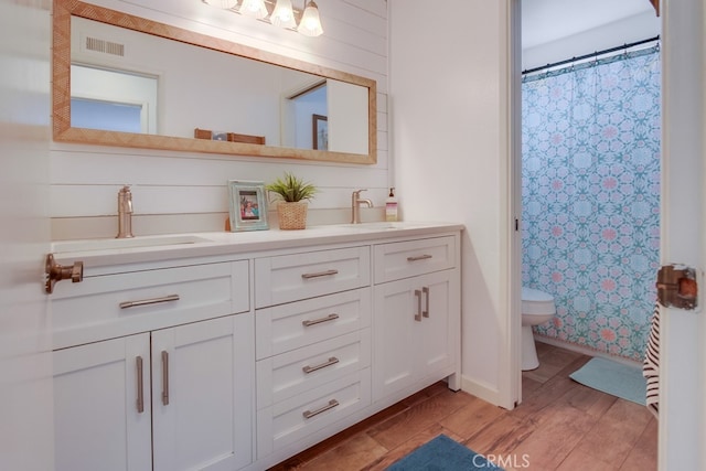 201 Todd Ct, Oceanside, CA 92054 - full bathroom with double vanity, wood finished floors, and curtained shower