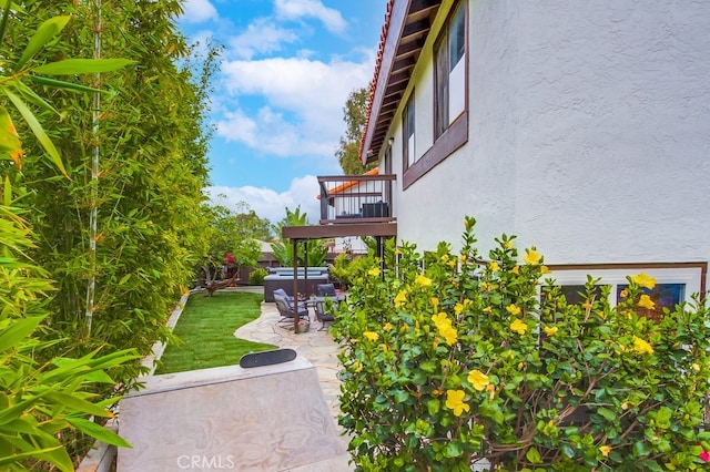 201 Todd Ct, Oceanside, CA 92054 - view of yard featuring a hot tub, a patio, and a balcony