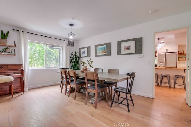 201 Todd Ct, Oceanside, CA 92054 - dining space with light wood-style floors and baseboards