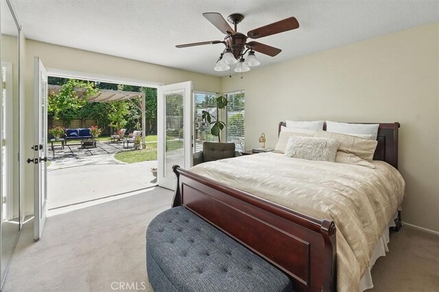 24214 Dalgo Dr, Valencia, CA 91355 - carpeted bedroom with access to exterior, ceiling fan, french doors, and baseboards