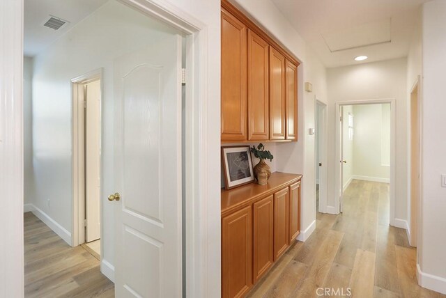 1019 N Sonora Cir, Orange, CA 92869 - hallway featuring light wood finished floors and recessed lighting