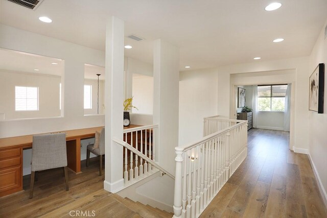 1019 N Sonora Cir, Orange, CA 92869 - corridor featuring an upstairs landing, a desk, wood finished floors, and recessed lighting