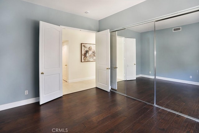 1019 N Sonora Cir, Orange, CA 92869 - unfurnished bedroom featuring hardwood / wood-style floors and a closet
