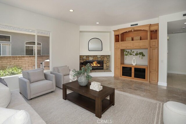 1019 N Sonora Cir, Orange, CA 92869 - living room featuring a fireplace and recessed lighting