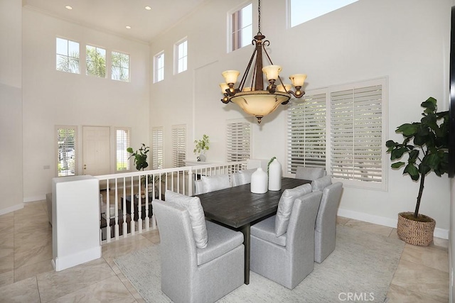 1019 N Sonora Cir, Orange, CA 92869 - dining area with a towering ceiling, a chandelier, and recessed lighting
