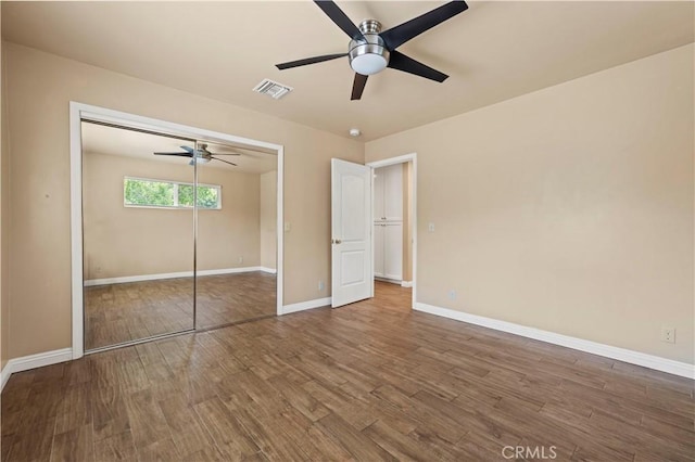 14230 Calahan St, Panorama City, CA 91402 - unfurnished bedroom featuring wood finished floors, baseboards, a closet, and ceiling fan