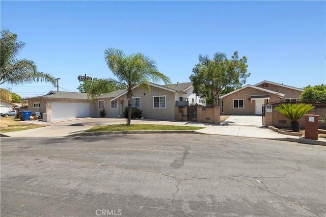 14230 Calahan St, Panorama City, CA 91402 - ranch-style home featuring driveway, a gate, and a garage