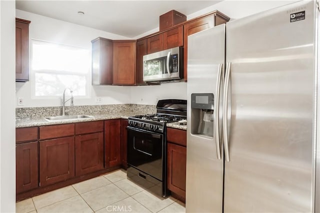 3504 Minnesota Trl, Frazier Park, CA 93225 - kitchen with appliances with stainless steel finishes, a sink, light tile patterned floors, and light stone countertops