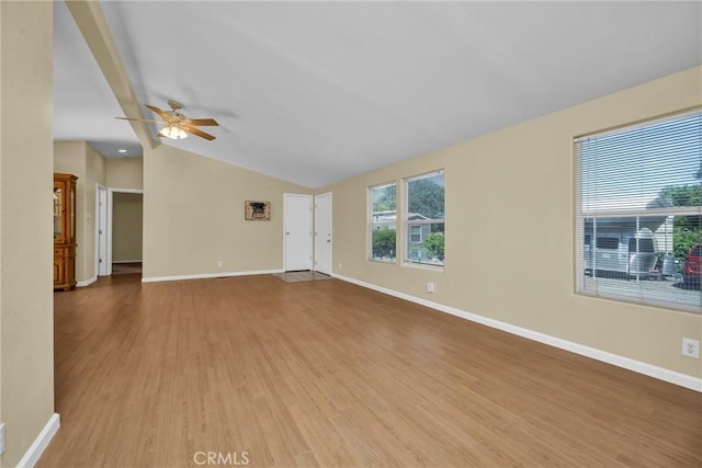 16410 Tish A Tang Rd, Lower Lake, CA 95457 - spare room featuring ceiling fan, vaulted ceiling, wood finished floors, and baseboards