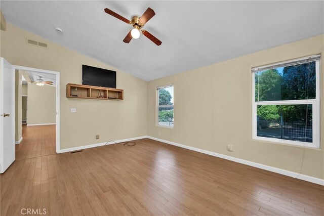 16410 Tish A Tang Rd, Lower Lake, CA 95457 - unfurnished room featuring ceiling fan, lofted ceiling, wood finished floors, and baseboards