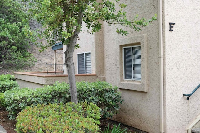 11215 Avenida De Los Lobos Unit F, Rancho Bernardo San Diego, CA 92127 - view of side of property with stucco siding