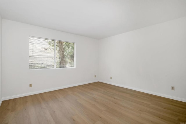 11215 Avenida De Los Lobos Unit F, Rancho Bernardo San Diego, CA 92127 - spare room featuring wood finished floors and baseboards