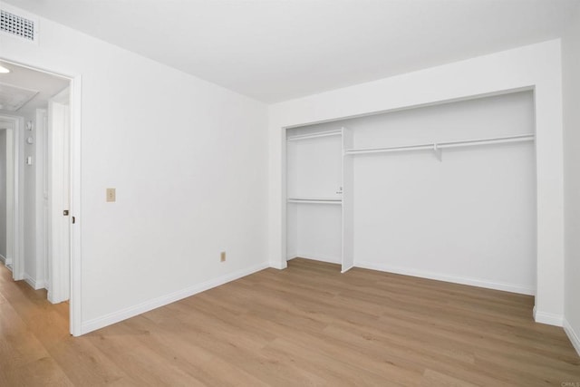 11215 Avenida De Los Lobos Unit F, Rancho Bernardo San Diego, CA 92127 - unfurnished bedroom featuring light wood-style flooring and a closet