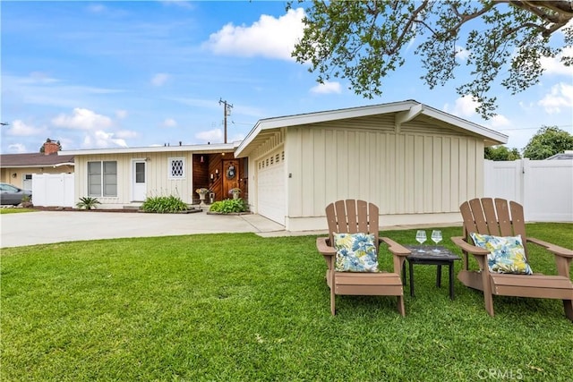 1418 S Sandsprings Dr, West Covina, CA 91790 - view of front of property featuring board and batten siding, concrete driveway, and an attached garage