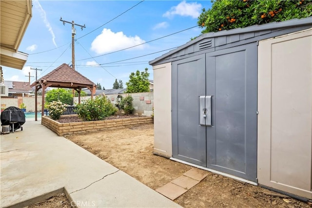 1418 S Sandsprings Dr, West Covina, CA 91790 - view of shed featuring a gazebo and a fenced backyard