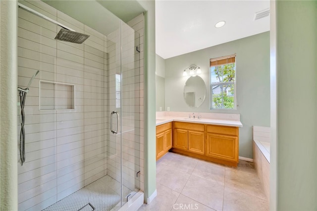 25 Ellsworth St Unit 11, Ladera Ranch, CA 92694 - bathroom featuring a shower stall, vanity, tile patterned flooring, and recessed lighting