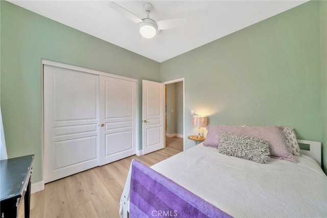25 Ellsworth St Unit 11, Ladera Ranch, CA 92694 - bedroom with light wood-style floors, a closet, baseboards, and a ceiling fan