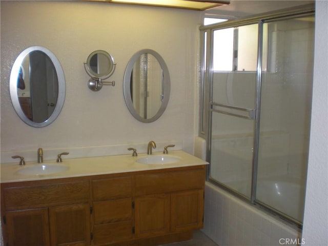 28265 La Bajada, Laguna Niguel, CA 92677 - bathroom with double vanity and shower / bath combination with glass door