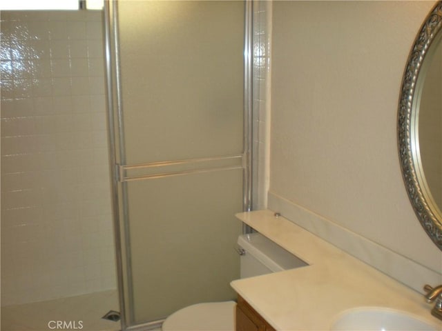 28265 La Bajada, Laguna Niguel, CA 92677 - bathroom with a stall shower, vanity, and toilet