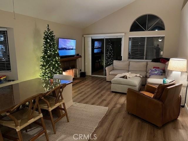 28265 La Bajada, Laguna Niguel, CA 92677 - living room featuring vaulted ceiling and wood finished floors