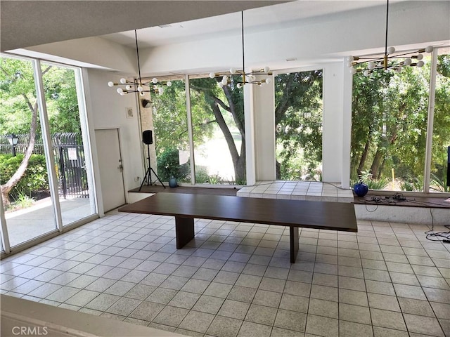 4734 Park Granada Unit 238, Calabasas, CA 91302 - playroom featuring a chandelier and light tile patterned floors