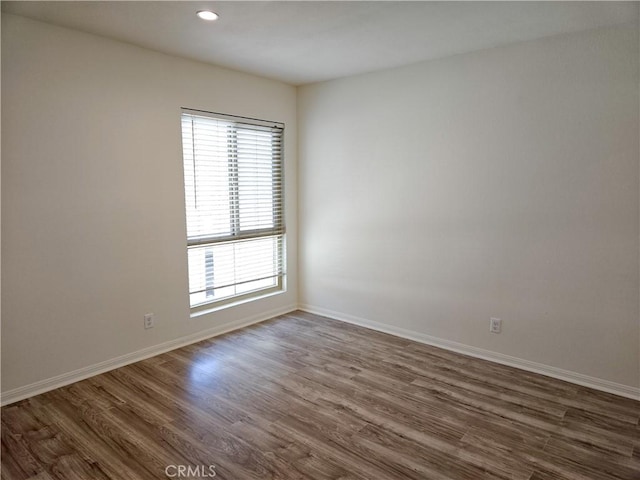 4734 Park Granada Unit 238, Calabasas, CA 91302 - empty room featuring plenty of natural light, dark wood-type flooring, baseboards, and recessed lighting