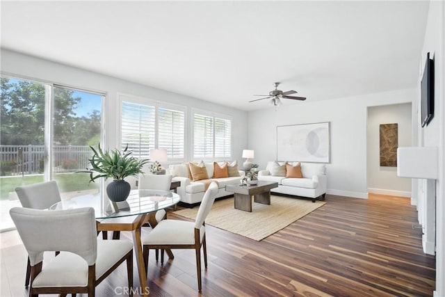 27170 Arrow Point Trl, Corona, CA 92883 - living room featuring healthy amount of natural light, baseboards, wood finished floors, and ceiling fan