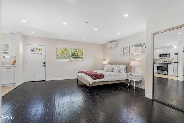 15233 Camarillo St, Sherman Oaks, CA 91403 - bedroom featuring freestanding refrigerator, a wall unit AC, wood-type flooring, baseboards, and recessed lighting