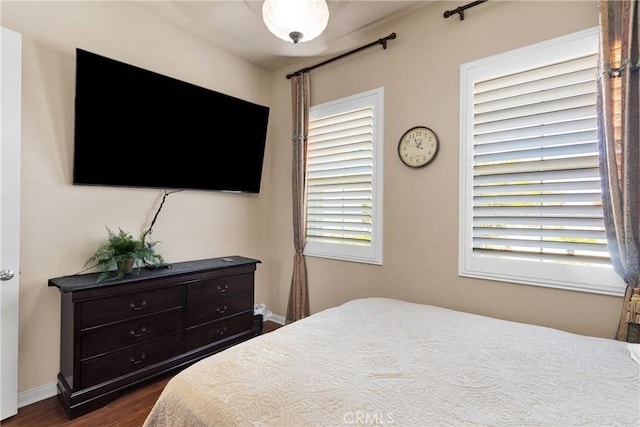 19423 Crystal Springs Ln, Apple Valley, CA 92308 - bedroom with dark wood finished floors and baseboards