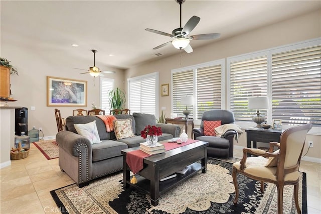 19423 Crystal Springs Ln, Apple Valley, CA 92308 - living room featuring ceiling fan, light tile patterned floors, and baseboards