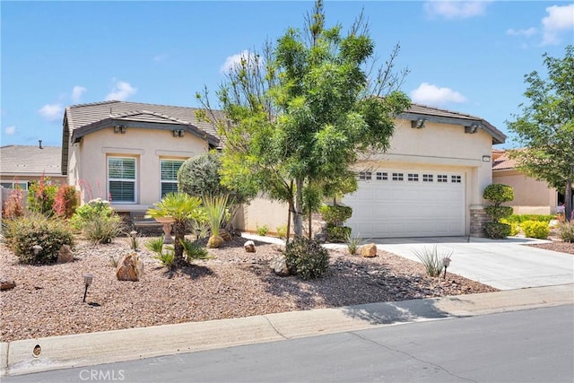 19423 Crystal Springs Ln, Apple Valley, CA 92308 - view of front of house with driveway, a garage, stucco siding, and a tile roof