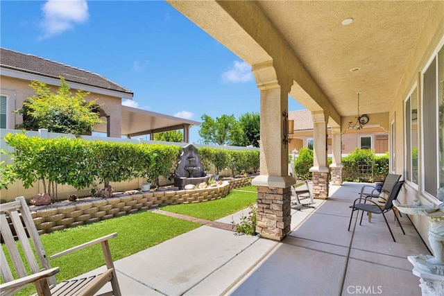 19423 Crystal Springs Ln, Apple Valley, CA 92308 - covered porch with a fenced backyard