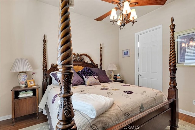 19423 Crystal Springs Ln, Apple Valley, CA 92308 - bedroom featuring wood finished floors, baseboards, a chandelier, and ceiling fan