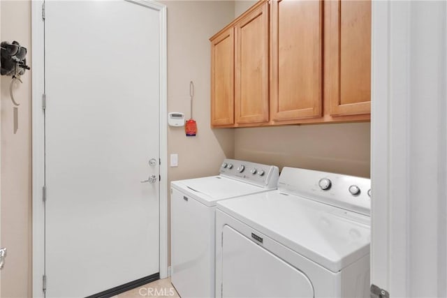 19423 Crystal Springs Ln, Apple Valley, CA 92308 - laundry area featuring washing machine and dryer and cabinet space