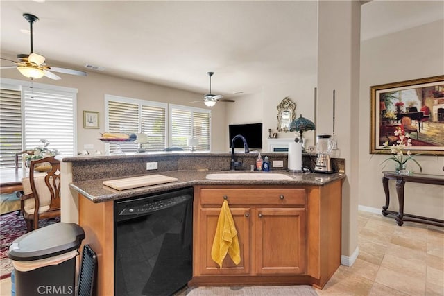 19423 Crystal Springs Ln, Apple Valley, CA 92308 - kitchen with dishwasher, a ceiling fan, a sink, brown cabinetry, and open floor plan