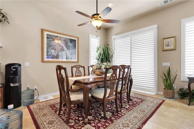 19423 Crystal Springs Ln, Apple Valley, CA 92308 - dining room featuring a ceiling fan, healthy amount of natural light, baseboards, and light tile patterned flooring