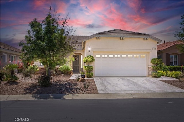 19423 Crystal Springs Ln, Apple Valley, CA 92308 - view of front of property with stucco siding, a garage, and driveway