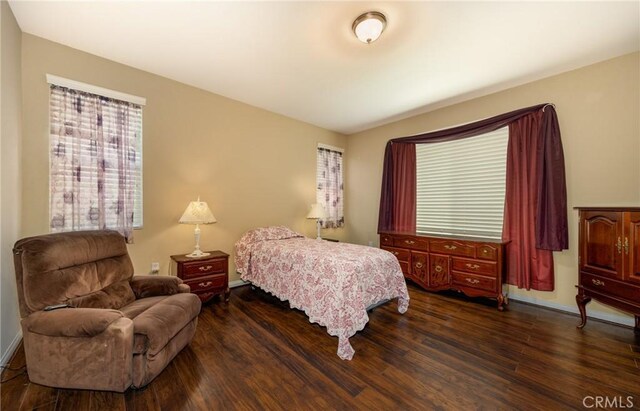 317 Calvert Park, Beaumont, CA 92223 - bedroom featuring dark wood-type flooring