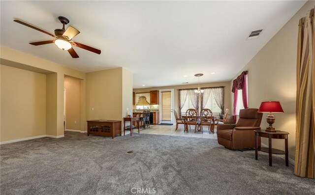 317 Calvert Park, Beaumont, CA 92223 - sitting room with carpet flooring, ceiling fan, and a chandelier