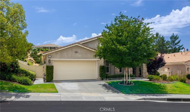 317 Calvert Park, Beaumont, CA 92223 - obstructed view of property with stucco siding, driveway, and an attached garage