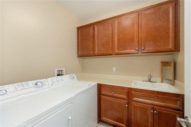 317 Calvert Park, Beaumont, CA 92223 - laundry area with cabinet space and washing machine and clothes dryer