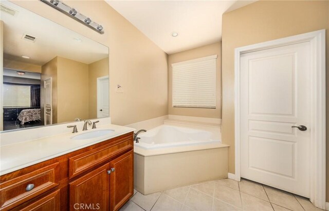 317 Calvert Park, Beaumont, CA 92223 - bathroom featuring vanity, a garden tub, tile patterned flooring, and connected bathroom